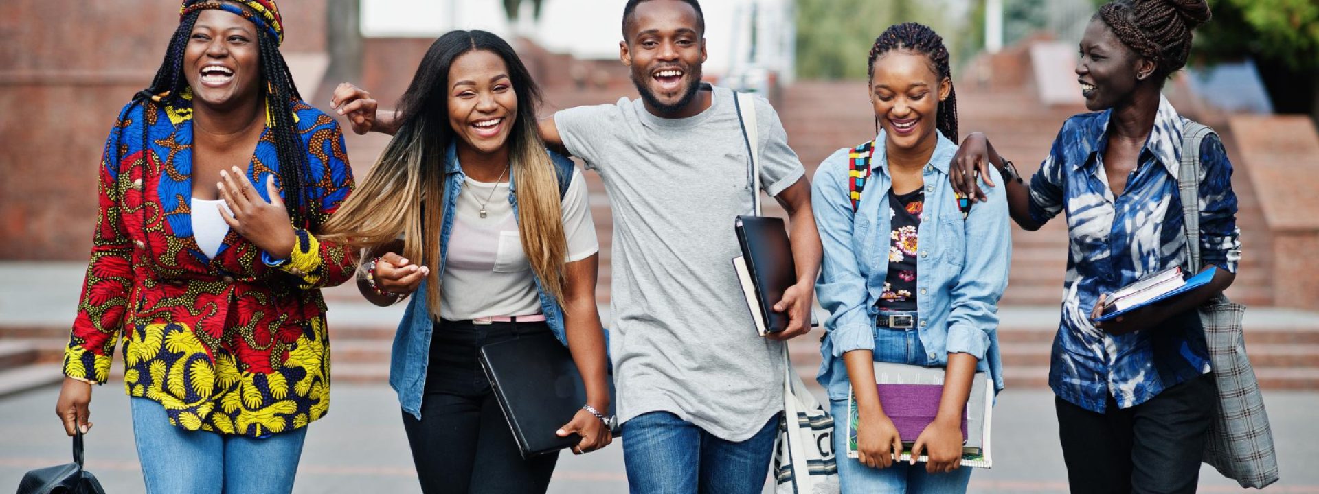group-five-african-college-students-spending-time-together-campus-university-yard-black-afro-friends-studying-education-theme
